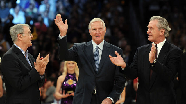 LOS ANGELES, CA - APRIL 06: Jerry West is announced to the crowd in front of Gail Goodrich and Pat Riley as the 1972 NBA Championshipi team is honored at halftime during the game between the Houston Rockets and the Los Angeles Lakers at Staples Center on April 6, 2012 in Los Angeles, California.