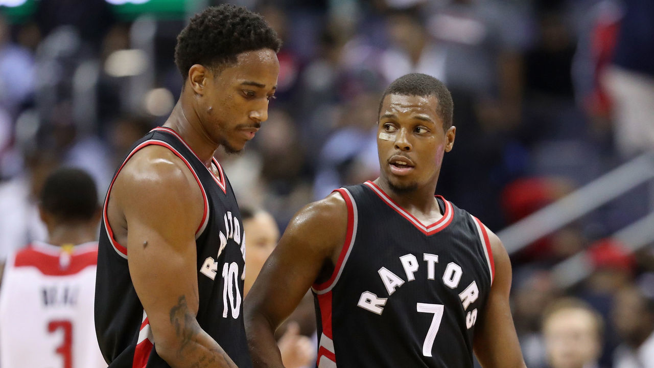 WASHINGTON, DC - NOVEMBER 02: DeMar DeRozan #10 of the Toronto Raptors and Kyle Lowry #7 talk during a fourth quarter timeout against the Washington Wizards at Verizon Center on November 2, 2016 in Washington, DC.