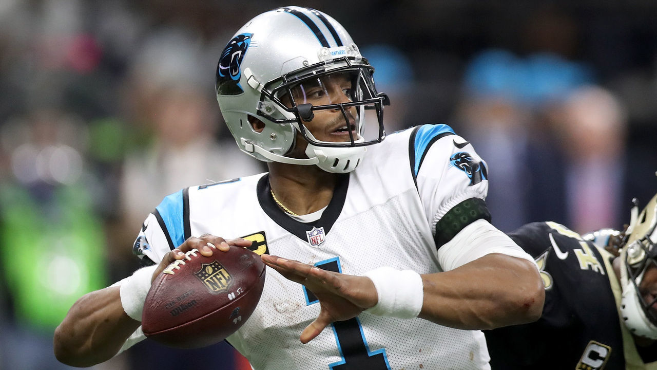NEW ORLEANS, LA - JANUARY 07: Cam Newton #1 of the Carolina Panthers is sacked by Cameron Jordan #94 of the New Orleans Saints at the Mercedes-Benz Superdome on January 7, 2018 in New Orleans, Louisiana.