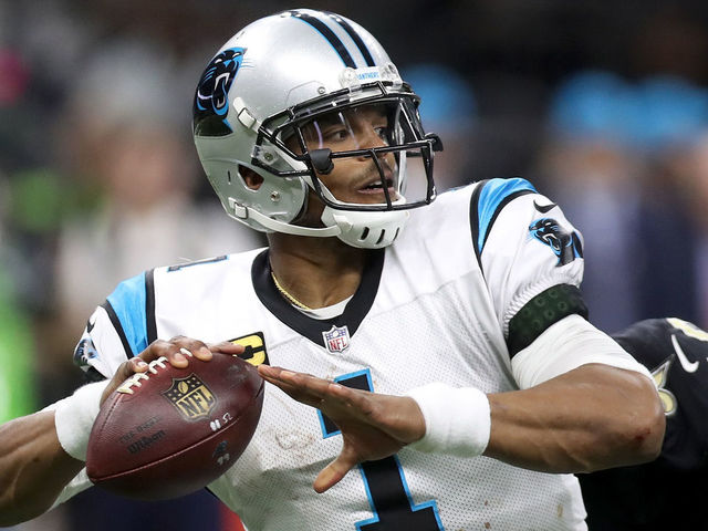 NEW ORLEANS, LA - JANUARY 07: Cam Newton #1 of the Carolina Panthers is sacked by Cameron Jordan #94 of the New Orleans Saints at the Mercedes-Benz Superdome on January 7, 2018 in New Orleans, Louisiana.