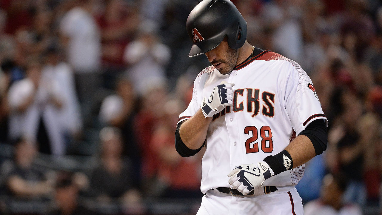 PHOENIX, AZ - SEPTEMBER 27: J.D. Martinez #28 of the Arizona Diamondbacks celebrates after hitting a solo home run in the ninth inning of the MLB game against the San Francisco Giants at Chase Field on September 27, 2017 in Phoenix, Arizona.