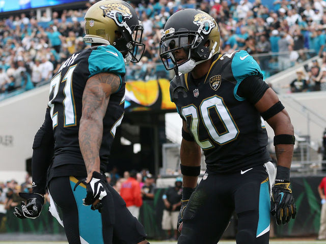 JACKSONVILLE, FL - DECEMBER 03: Jalen Ramsey #20 and A.J. Bouye #21 of the Jacksonville Jaguars celebrate after Ramsey had an interception in the first half of their game against the Indianapolis Colts at EverBank Field on December 3, 2017 in Jacksonville, Florida.