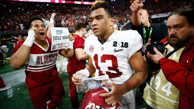 ATLANTA, GA - JANUARY 08: Tua Tagovailoa #13 of the Alabama Crimson Tide celebrates beating the Georgia Bulldogs in overtime to win the CFP National Championship presented by AT&T at Mercedes-Benz Stadium on January 8, 2018 in Atlanta, Georgia.