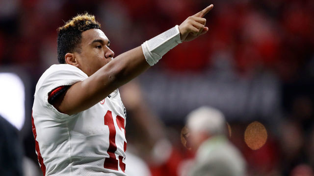 ATLANTA, GA - JANUARY 08: Tua Tagovailoa #13 of the Alabama Crimson Tide celebrates beating the Georgia Bulldogs in overtime to win the CFP National Championship presented by AT&T at Mercedes-Benz Stadium on January 8, 2018 in Atlanta, Georgia.