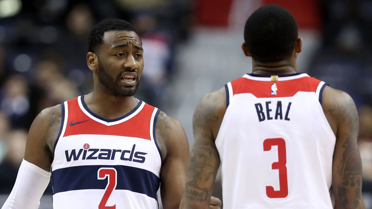 WASHINGTON, DC - DECEMBER 13: John Wall #2 and Bradley Beal #3 of the Washington Wizards talk during the second half against the Memphis Grizzlies at Capital One Arena on December 13, 2017 in Washington, DC.