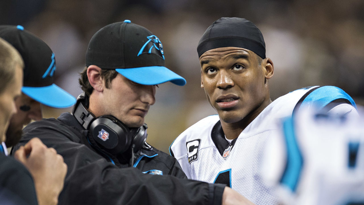 NEW ORLEANS, LA - DECEMBER 8: Quarterbacks Coach Ken Dorsey and Cam Newton #1 of the Carolina Panthers talk on the sidelines during a game against the New Orleans Saints at Mercedes-Benz Superdome on December 8, 2013 in New Orleans, Louisiana. The Saints defeated the Panthers 31-13.