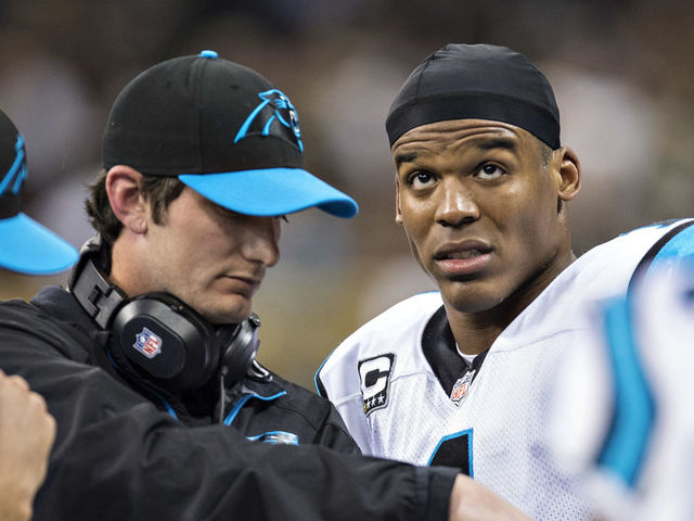 NEW ORLEANS, LA - DECEMBER 8: Quarterbacks Coach Ken Dorsey and Cam Newton #1 of the Carolina Panthers talk on the sidelines during a game against the New Orleans Saints at Mercedes-Benz Superdome on December 8, 2013 in New Orleans, Louisiana. The Saints defeated the Panthers 31-13.