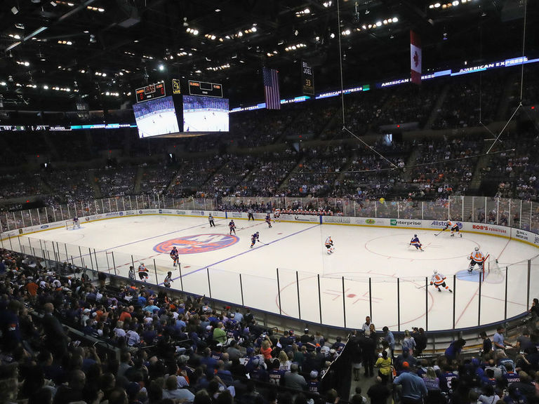 Bettman, Islanders owner tour Nassau Coliseum as possible temporary ...