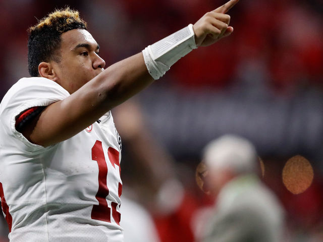 ATLANTA, GA - JANUARY 08: Tua Tagovailoa #13 of the Alabama Crimson Tide celebrates beating the Georgia Bulldogs in overtime to win the CFP National Championship presented by AT&T at Mercedes-Benz Stadium on January 8, 2018 in Atlanta, Georgia.