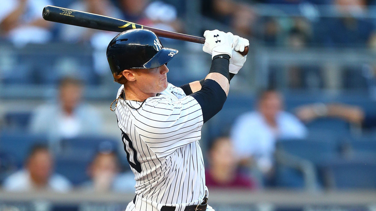 NEW YORK, NY - JULY 07: Clint Frazier #30 of the New York Yankees hits a sacrifice fly scoring Didi Gregorius #18 in the second inning against the Milwaukee Brewers at Yankee Stadium on July 7, 2017 in the Bronx borough of New York City.