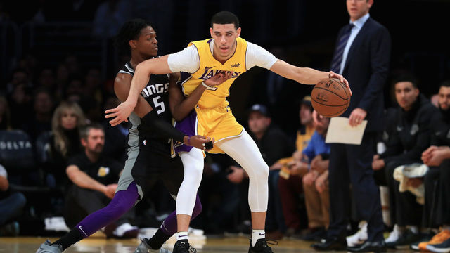 LOS ANGELES, CA - JANUARY 09: De'Aaron Fox #5 of the Sacramento Kings defends against the dribble of Lonzo Ball #2 of the Los Angeles Lakers during the first half of a game at Staples Center on January 9, 2018 in Los Angeles, California.