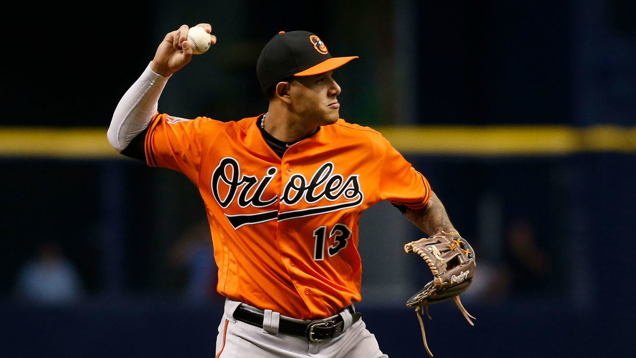 ST. PETERSBURG, FL - SEPTEMBER 30: Third baseman Manny Machado #13 of the Baltimore Orioles fields the ground out by Wilson Ramos of the Tampa Bay Rays to end the first inning of a game on September 30, 2017 at Tropicana Field in St. Petersburg, Florida.