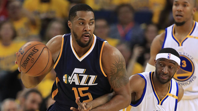 OAKLAND, CA - MAY 04: Ian Clark #21 of the Golden State Warriors defends against Derrick Favors #15 of the Utah Jazz during Game Two of the NBA Western Conference Semi-Finals at ORACLE Arena on May 4, 2017 in Oakland, California.