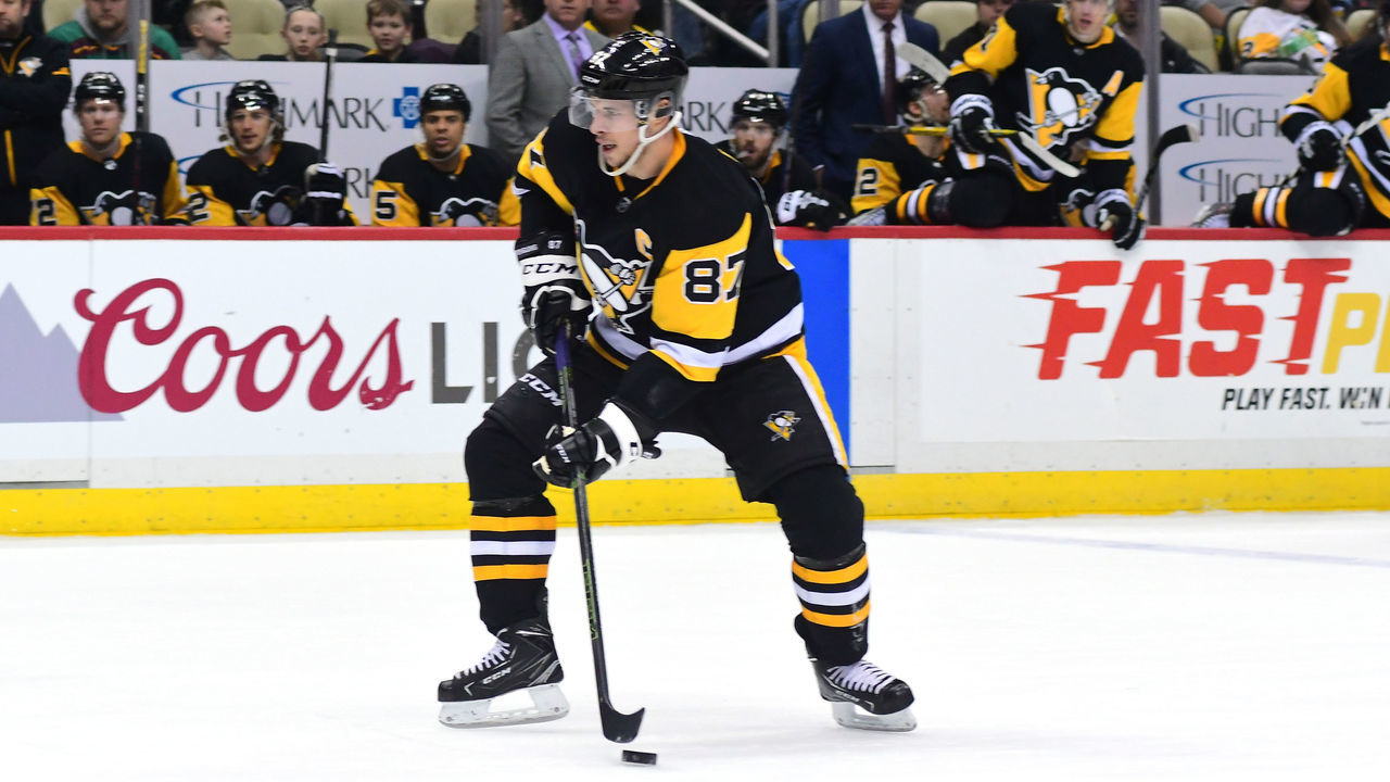 PITTSBURGH, PA - JANUARY 07: Sidney Crosby #87 of the Pittsburgh Penguins skates with the puck against the Boston Bruins at PPG PAINTS Arena on January 7, 2018 in Pittsburgh, Pennsylvania.