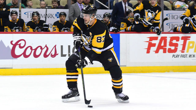 PITTSBURGH, PA - JANUARY 07: Sidney Crosby #87 of the Pittsburgh Penguins skates with the puck against the Boston Bruins at PPG PAINTS Arena on January 7, 2018 in Pittsburgh, Pennsylvania.