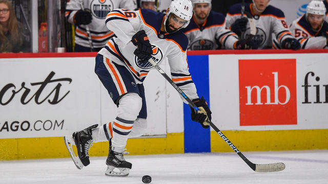 CHICAGO, IL - JANUARY 07: Edmonton Oilers left wing Jujhar Khaira (16) watches the puck during a game between the Chicago Blackhawks and the Edmonton Oilers on January 7, 2018, at the United Center in Chicago, IL.