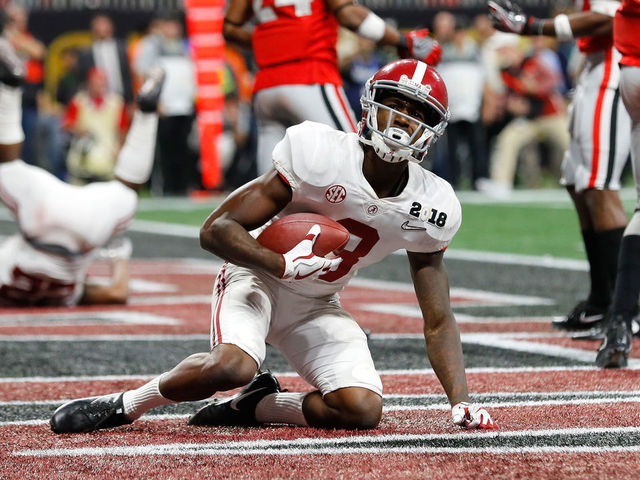 ATLANTA, GA - JANUARY 08: Calvin Ridley #3 of the Alabama Crimson Tide makes a catch for a seven yard touchdown during the fourth quarter against the Georgia Bulldogs in the CFP National Championship presented by AT&T at Mercedes-Benz Stadium on January 8, 2018 in Atlanta, Georgia.