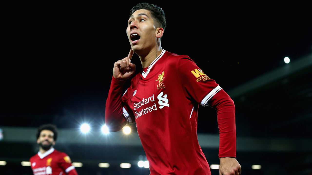 LIVERPOOL, ENGLAND - DECEMBER 26: Roberto Firmino of Liverpool celebrates after scoring his sides second goal during the Premier League match between Liverpool and Swansea City at Anfield on December 26, 2017 in Liverpool, England.