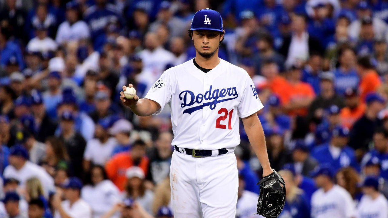 LOS ANGELES, CA - NOVEMBER 01: Yu Darvish #21 of the Los Angeles Dodgers reacts in the first inning against the Houston Astros in game seven of the 2017 World Series at Dodger Stadium on November 1, 2017 in Los Angeles, California.
