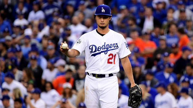 LOS ANGELES, CA - NOVEMBER 01: Yu Darvish #21 of the Los Angeles Dodgers reacts in the first inning against the Houston Astros in game seven of the 2017 World Series at Dodger Stadium on November 1, 2017 in Los Angeles, California.