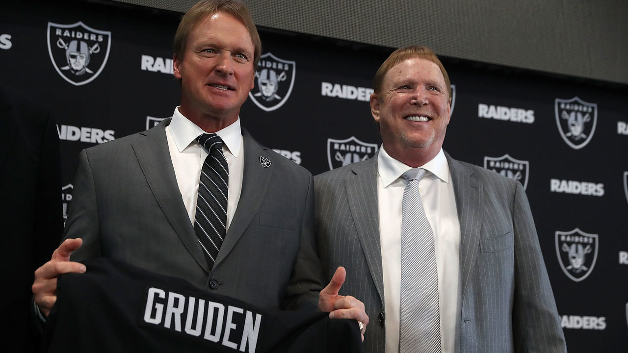 ALAMEDA, CA - JANUARY 09: Oakland Raiders new head coach Jon Gruden (L) and Raiders owner Mark Davis pose for a photograph during a news conference at Oakland Raiders headquarters on January 9, 2018 in Alameda, California. Jon Gruden has returned to the Oakland Raiders after leaving the team in 2001.