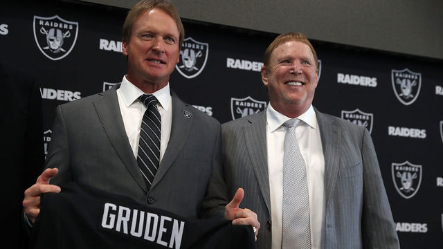 ALAMEDA, CA - JANUARY 09: Oakland Raiders new head coach Jon Gruden (L) and Raiders owner Mark Davis pose for a photograph during a news conference at Oakland Raiders headquarters on January 9, 2018 in Alameda, California. Jon Gruden has returned to the Oakland Raiders after leaving the team in 2001.