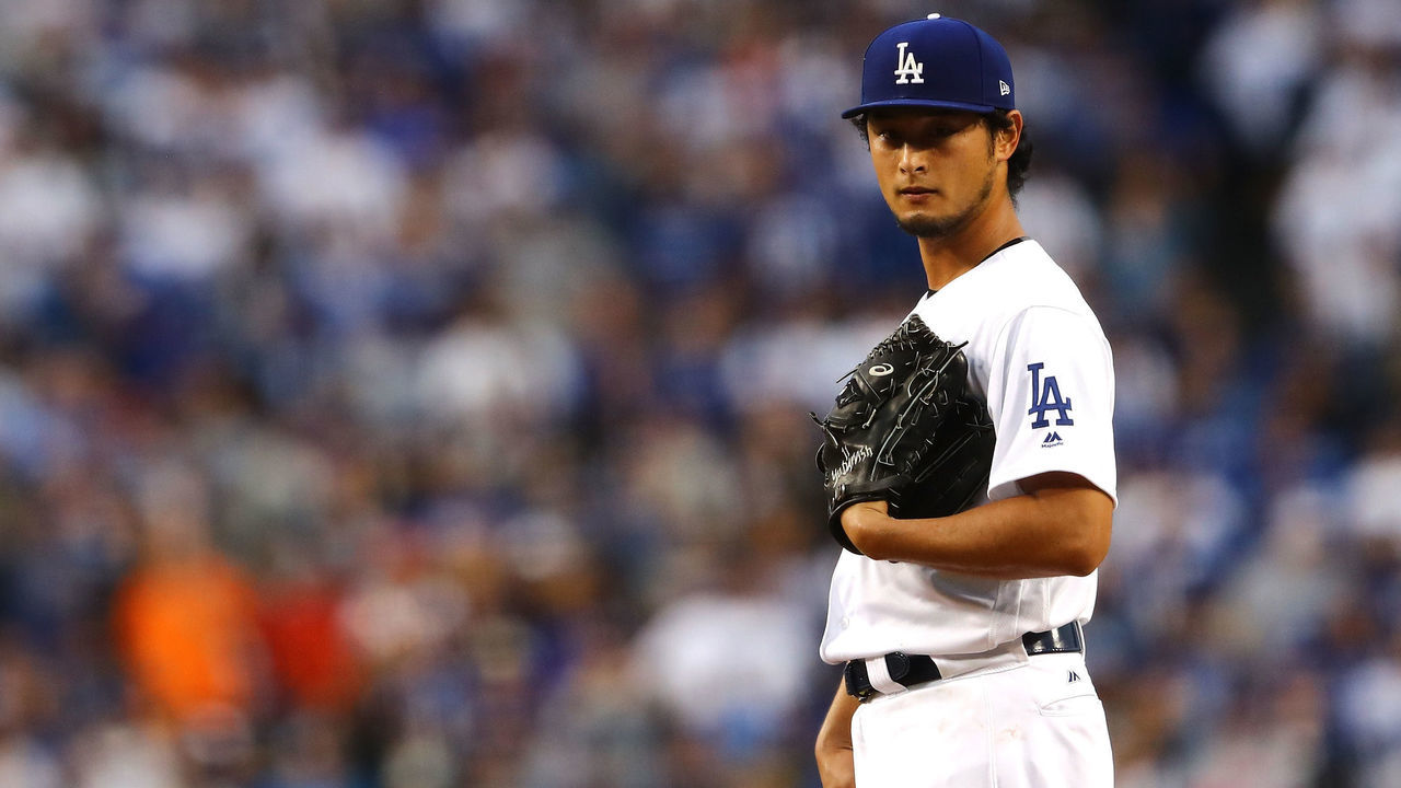 LOS ANGELES, CA - NOVEMBER 01: Yu Darvish #21 of the Los Angeles Dodgers reacts in the first inning against the Houston Astros in game seven of the 2017 World Series at Dodger Stadium on November 1, 2017 in Los Angeles, California.