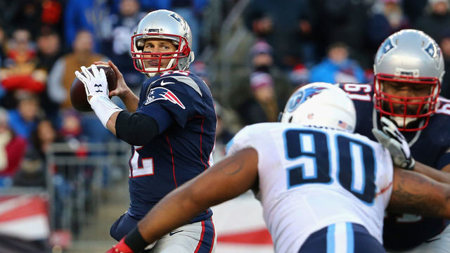 FOXBORO, MA - DECEMBER 20: Tom Brady #12 of the New England Patriots looks to pass during the game against the Tennessee Titans at Gillette Stadium on December 20, 2015 in Foxboro, Massachusetts.