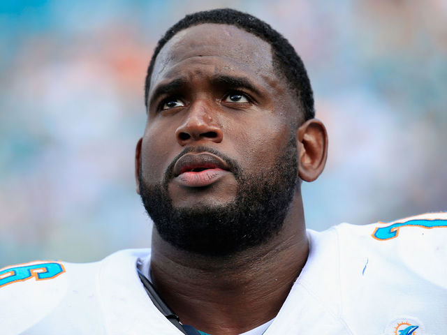 MIAMI GARDENS, FL - OCTOBER 25: Branden Albert #76 of the Miami Dolphins looks on during a game against the Houston Texans at Sun Life Stadium on October 25, 2015 in Miami Gardens, Florida.