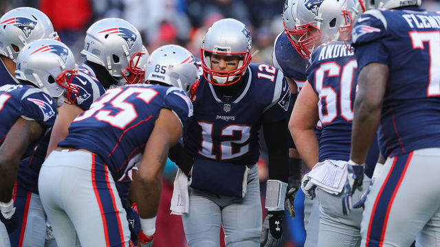 FOXBORO, MA - DECEMBER 31: Tom Brady #12 of the New England Patriots huddles with teammates during the second half against the New York Jets at Gillette Stadium on December 31, 2017 in Foxboro, Massachusetts.