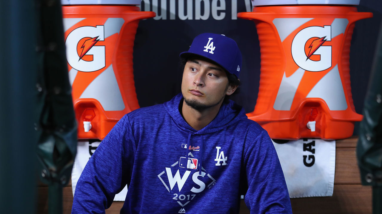 HOUSTON, TX - OCTOBER 28: Yu Darvish #21 of the Los Angeles Dodgers looks on during warm ups before game four of the 2017 World Series against the Houston Astros at Minute Maid Park on October 28, 2017 in Houston, Texas.