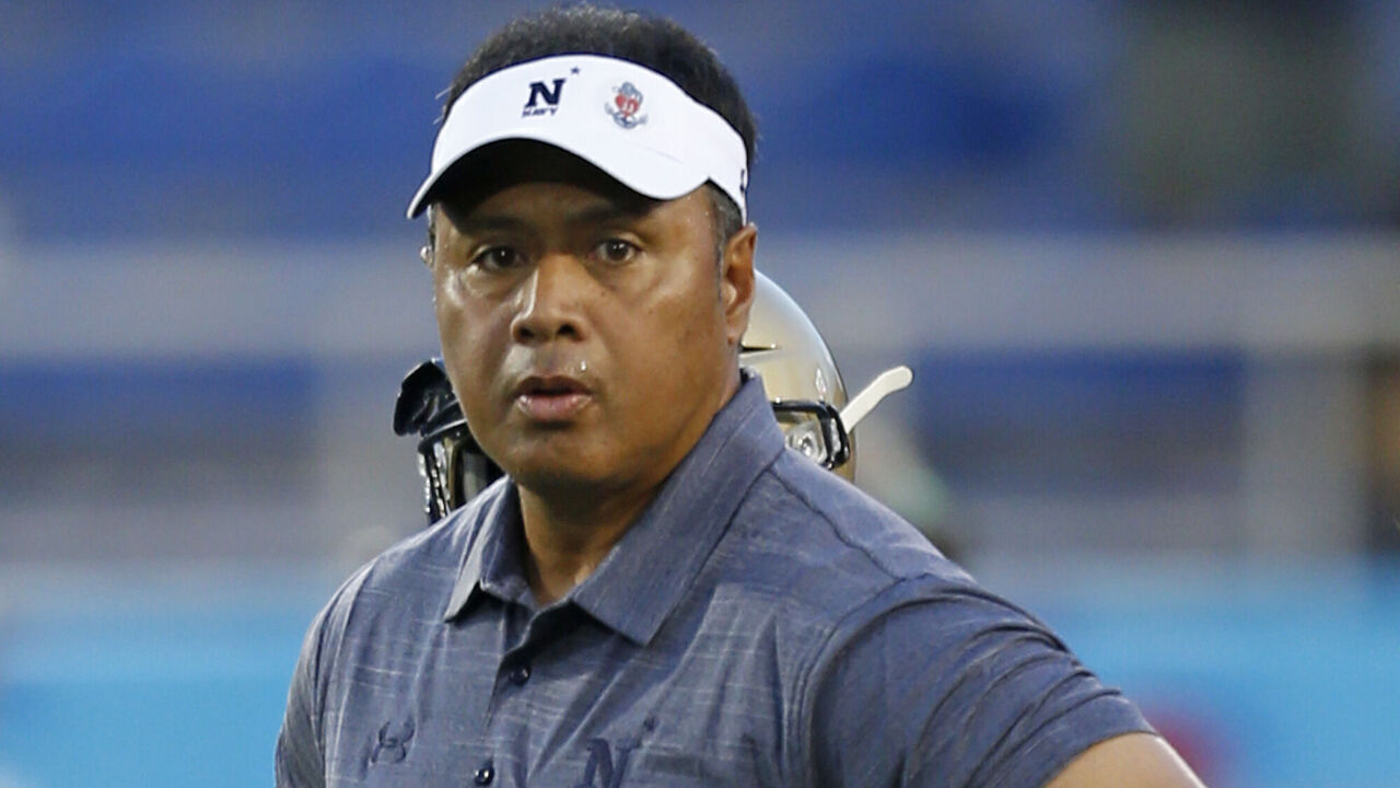 BOCA RATON, FL - SEPTEMBER 1: Head coach Ken Niumatalolo of the Navy Midshipmen watches the players warm up prior to the game against the Florida Atlantic Owls on September 1, 2017 at FAU Stadium in Boca Raton, Florida.