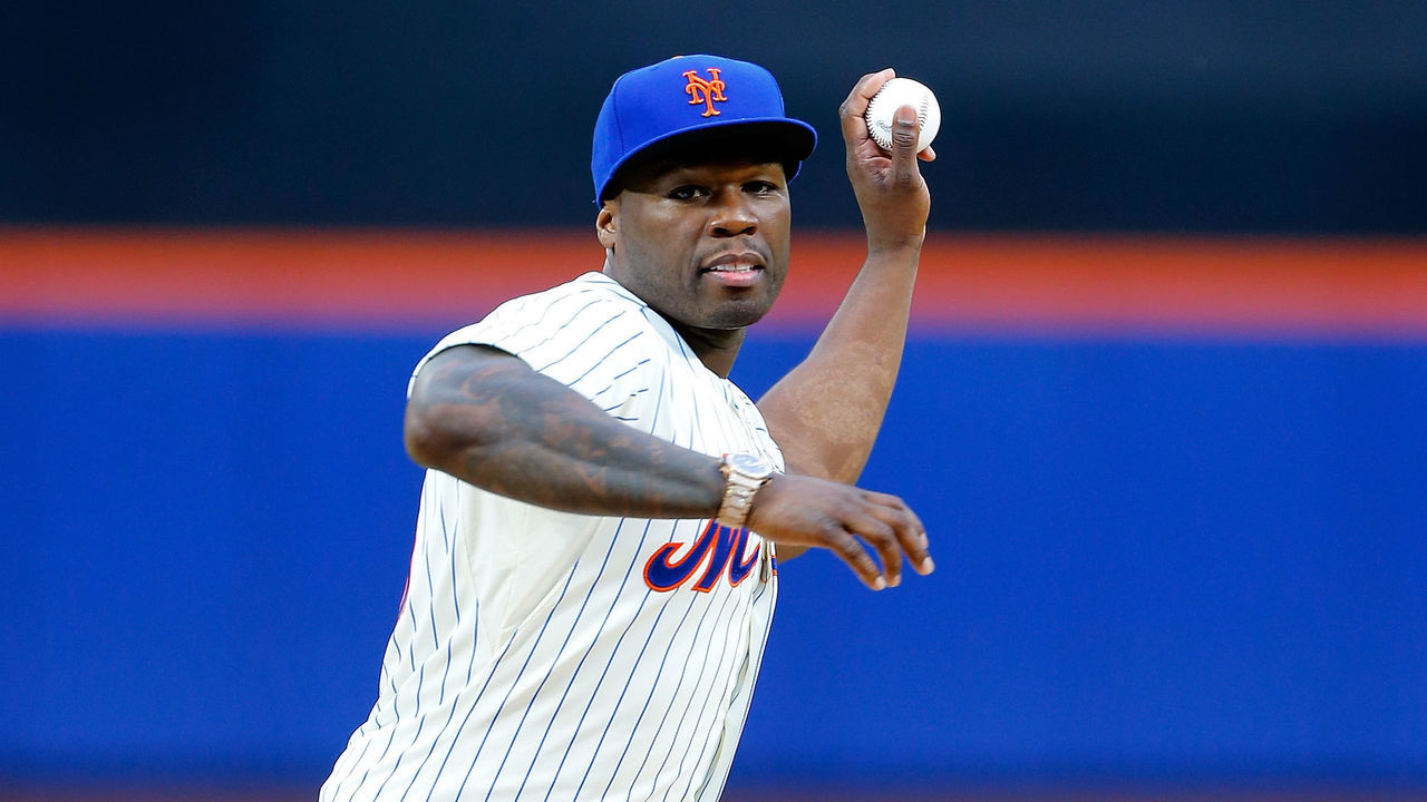 NEW YORK, NY - MAY 27: Rap artist 50 Cent throws the ceremonial first pitch of a game between the New York Mets and the Pittsburgh Pirates at Citi Field on May 27, 2014 in the Flushing neighborhood of the Queens borough of New York City.