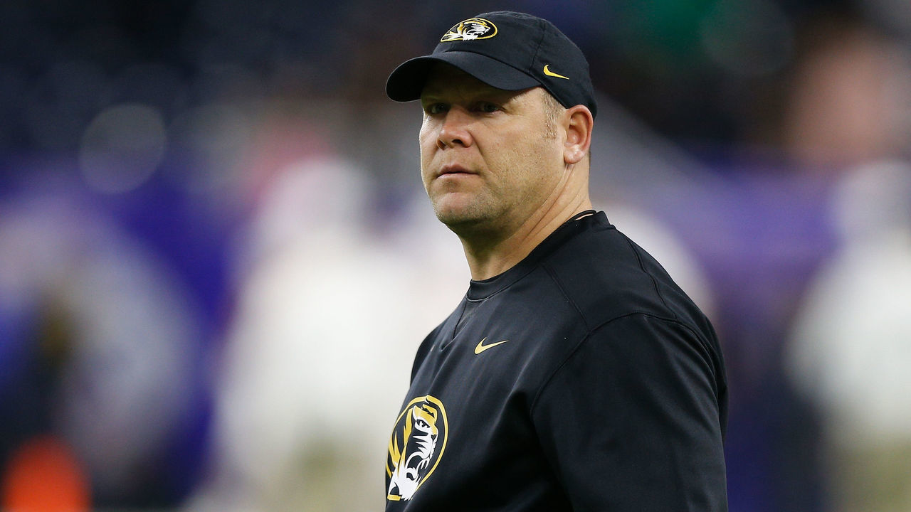 HOUSTON, TX - DECEMBER 27: Head coach Barry Odom of the Missouri Tigers takes the field during warm ups before playing the Texas Longhorns in the Academy Sports & Outdoors Bowl at NRG Stadium on December 27, 2017 in Houston, Texas.