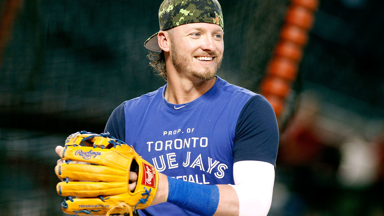 PHOENIX, AZ - JULY 19: Josh Donaldson #20 of the Toronto Blue Jays smiles as he warms up before the start of a MLB interleague game against the Arizona Diamondbacks at Chase Field on July 19, 2016 in Phoenix, Arizona.
