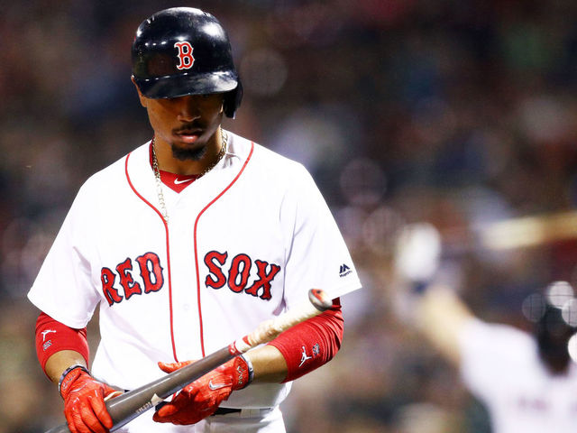 BOSTON, MA - SEPTEMBER 6: Mookie Betts #50 of the Boston Red Sox walks to the batters box during the first inning against the Toronto Blue Jays at Fenway Park on September 6, 2017 in Boston, Massachusetts.