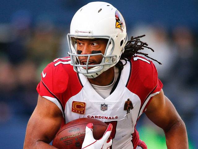 SEATTLE, WA - DECEMBER 31: Wide receiver Larry Fitzgerald #11 of the Arizona Cardinals makes a catch against the Seattle Seahawks in the first quarter at CenturyLink Field on December 31, 2017 in Seattle, Washington.