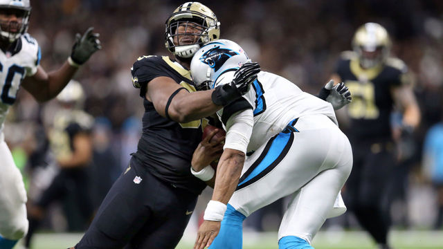 NEW ORLEANS, LA - JANUARY 07: Cam Newton #1 of the Carolina Panthers was forced to leave the game after his collision with David Onyemata #93 of the New Orleans Saints during the second half of the NFC Wild Card playoff game at the Mercedes-Benz Superdome on January 7, 2018 in New Orleans, Louisiana.