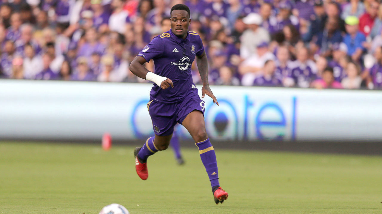 ORLANDO, FL - MARCH 05: Cyle Larin #9 of Orlando City SC chases the ball during a MLS soccer match between New York City FC and Orlando City SC at the Orlando City Stadium on March 5, 2017 in Orlando, Florida.