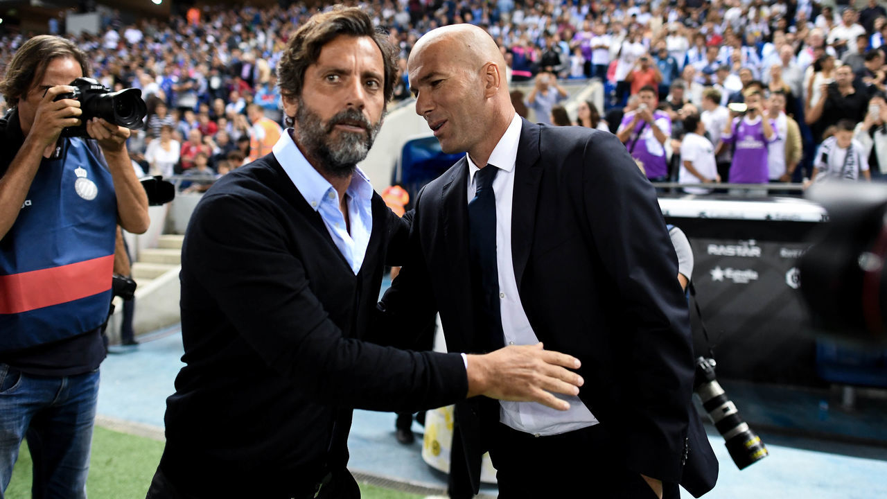 BARCELONA, SPAIN - SEPTEMBER 18: Head coach Quique Sanchez Flores (L) of RCD Espanyol and Head coach Zinedine Zidane of Real Madrid CF shake hands prior to the La Liga match between RCD Espanyol and Real Madrid CF at the RCDE stadium on September 18, 2016 in Barcelona, Spain.