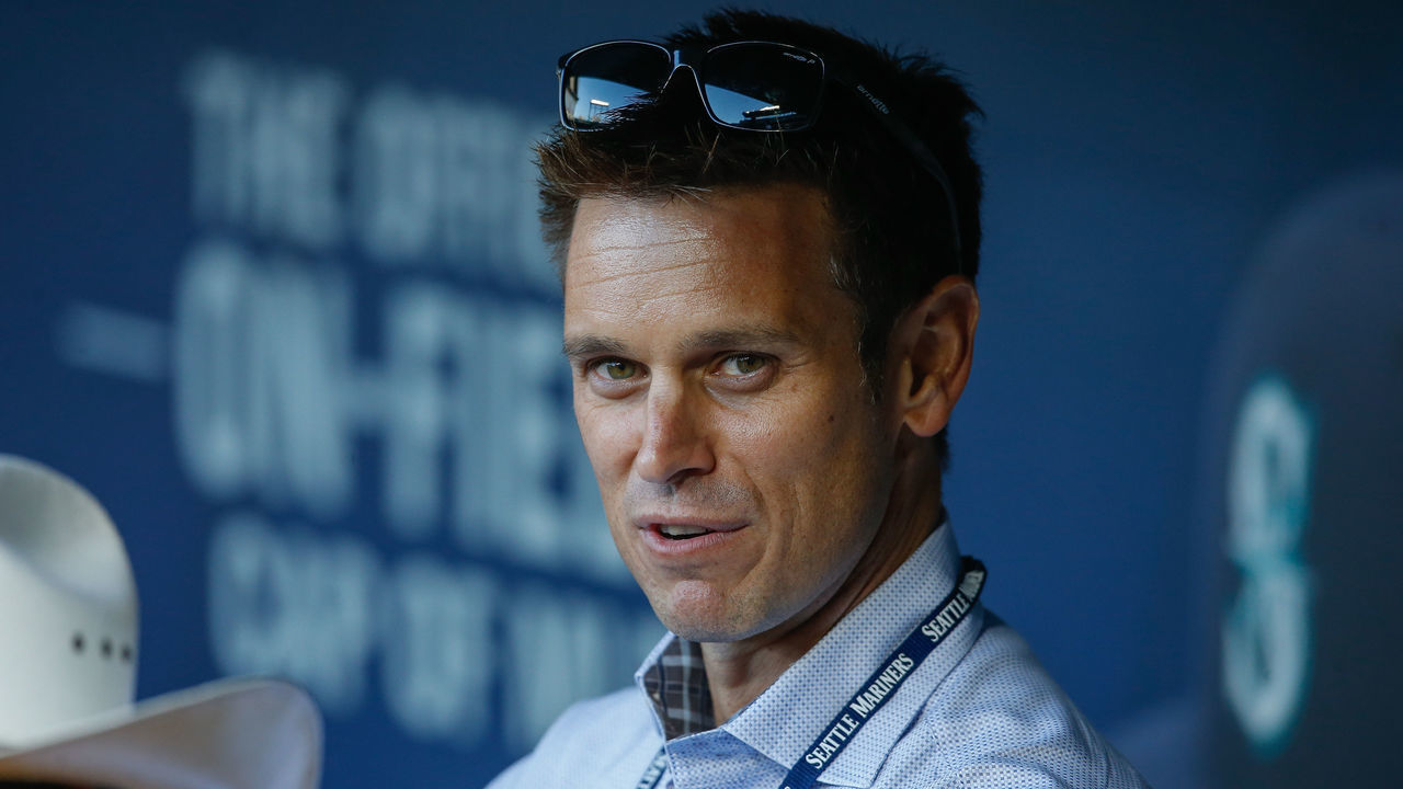 SEATTLE, WA - SEPTEMBER 30: GM Jerry Dipoto of the Seattle Mariners looks on from the dugout prior to the game against the Houston Astros at Safeco Field on September 30, 2015 in Seattle, Washington.