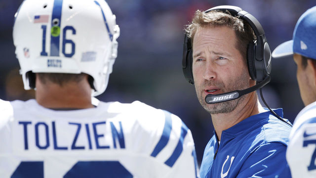 INDIANAPOLIS, IN - AUGUST 13: Indianapolis Colts quarterbacks coach Brian Schottenheimer talks to Scott Tolzien #16 during a preseason game against the Detroit Lions at Lucas Oil Stadium on August 13, 2017 in Indianapolis, Indiana.