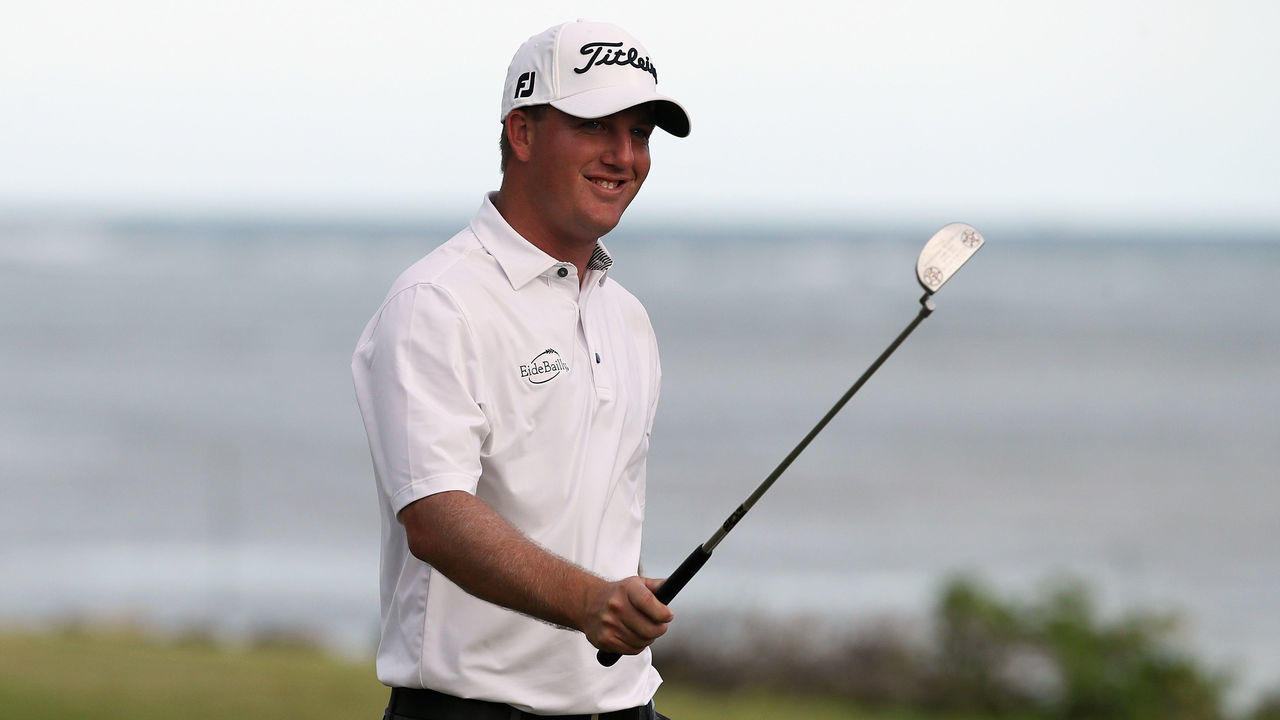 HONOLULU, HI - JANUARY 13: Tom Hoge of the United States reacts after a birdie putt on the 17th green during round three of the Sony Open In Hawaii at Waialae Country Club on January 13, 2018 in Honolulu, Hawaii.