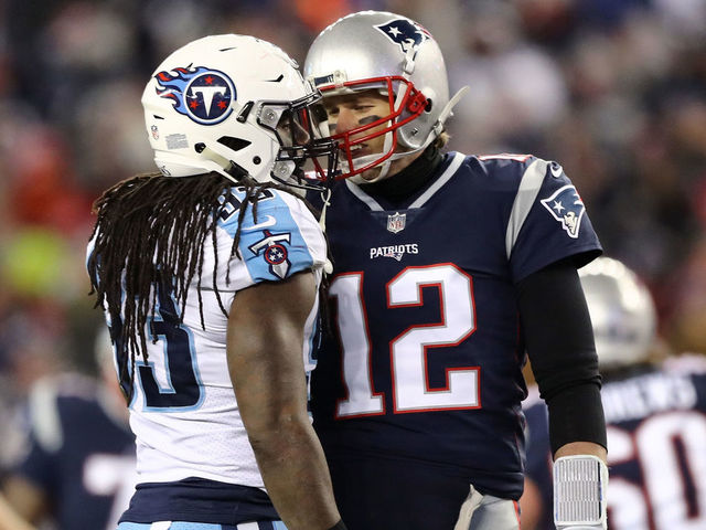 FOXBOROUGH, MA - JANUARY 13: Tom Brady #12 of the New England Patriots talks with Erik Walden #93 of the Tennessee Titans during the second quarter in the AFC Divisional Playoff game at Gillette Stadium on January 13, 2018 in Foxborough, Massachusetts.