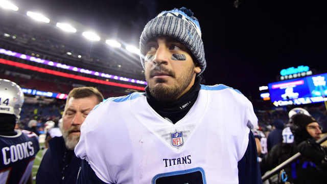 FOXBOROUGH, MA - JANUARY 13: Marcus Mariota #8 of the Tennessee Titans reacts after the AFC Divisional Playoff game against the New England Patriots at Gillette Stadium on January 13, 2018 in Foxborough, Massachusetts.
