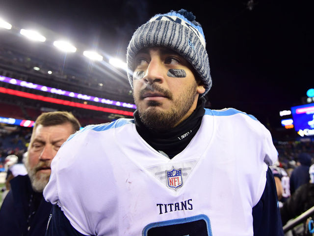 FOXBOROUGH, MA - JANUARY 13: Marcus Mariota #8 of the Tennessee Titans reacts after the AFC Divisional Playoff game against the New England Patriots at Gillette Stadium on January 13, 2018 in Foxborough, Massachusetts.