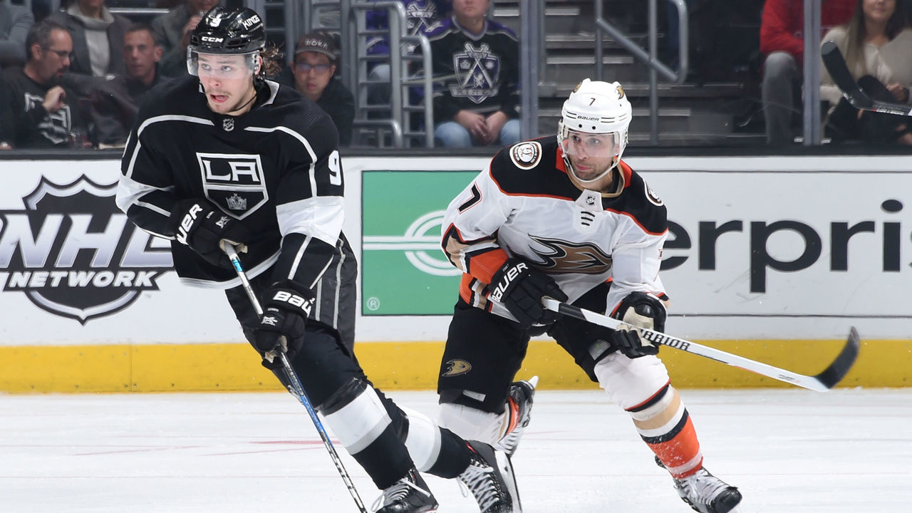 LOS ANGELES, CA - JANUARY 13: Adrian Kempe #9 of the Los Angeles Kings handles the puck against Andrew Cogliano #7 of the Anaheim Ducks at STAPLES Center on January 13, 2018 in Los Angeles, California.