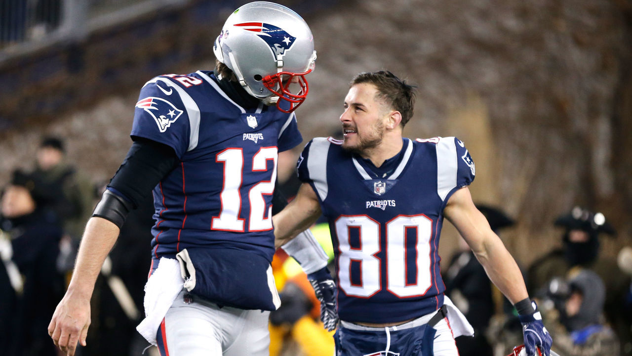 FOXBOROUGH, MA - JANUARY 13: Tom Brady #12 reacts with Danny Amendola #80 of the New England Patriots after a touchdown in the third quarter of the AFC Divisional Playoff game against the Tennessee Titans at Gillette Stadium on January 13, 2018 in Foxborough, Massachusetts.