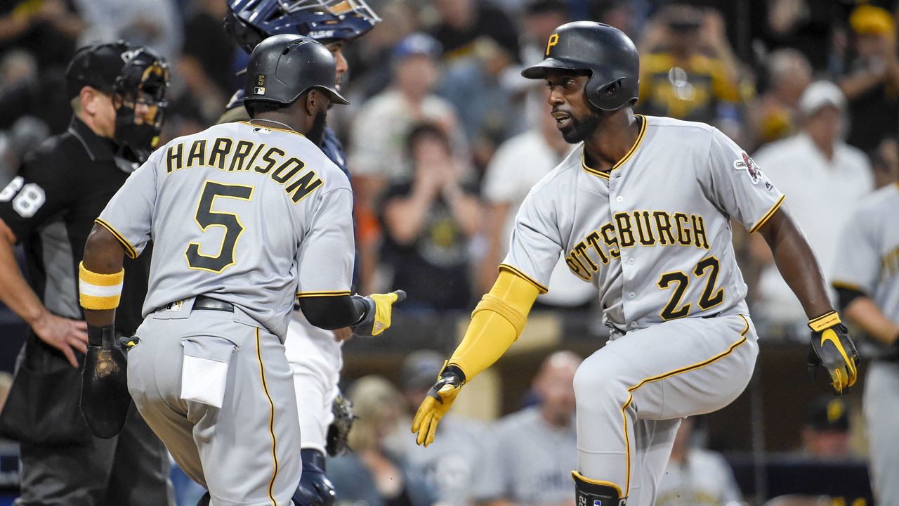 SAN DIEGO, CA - JULY 28: Andrew McCutchen #22 of the Pittsburgh Pirates, right, celebrates with Josh Harrison #5 after he hit a two-run home run during the third inning of a baseball game against the San Diego Padres at PETCO Park on July 28, 2017 in San Diego, California.