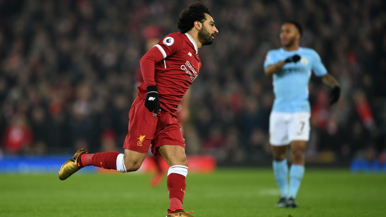 LIVERPOOL, ENGLAND - JANUARY 14: Mohamed Salah of Liverpool celebrates after scoring the fourth Liverpool goal during the Premier League match between Liverpool and Manchester City at Anfield on January 14, 2018 in Liverpool, England.